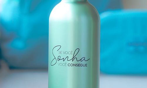 Collection of minimalist gym accessories in cyan neon lighting