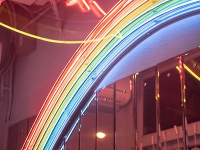 Soft neon glows representing evening relaxation and steady rhythm